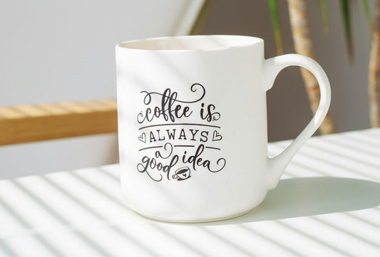 White ceramic mug with text design